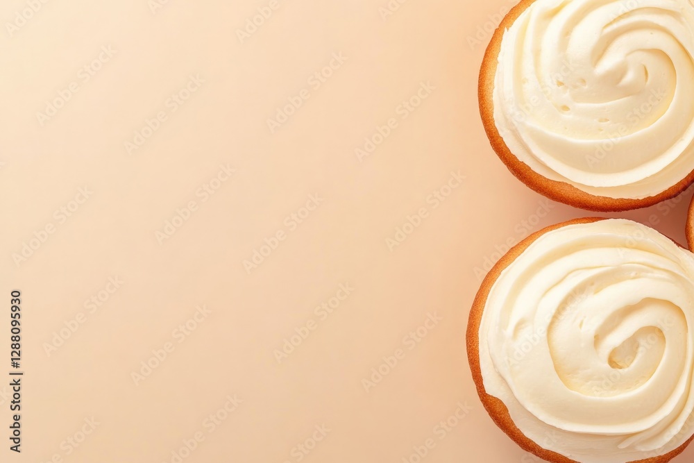 Swirls of creamy frosting atop soft pastries create an inviting Swirls of creamy frosting atop soft pastries create an inviting