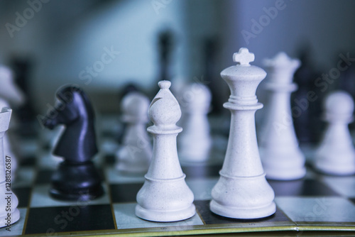 Chess board with chess pieces, business concept of success and strategy photo