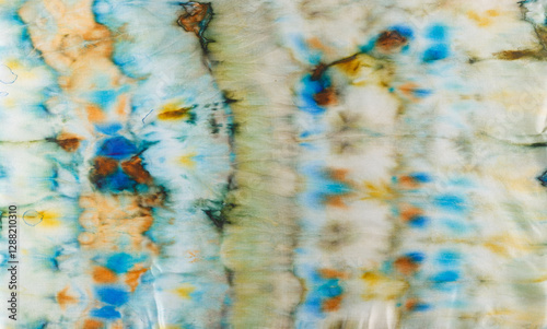 Obraz na płótnie abstract pattern on silk fabric texture in blue, yellow, green colors w salonie