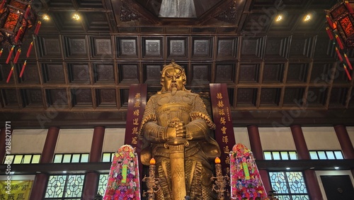 The giant golden statue of Che Kung Miu in Che Kung Templeม Sha Tin, Hong Kong- 12 Feb, 2025 photo