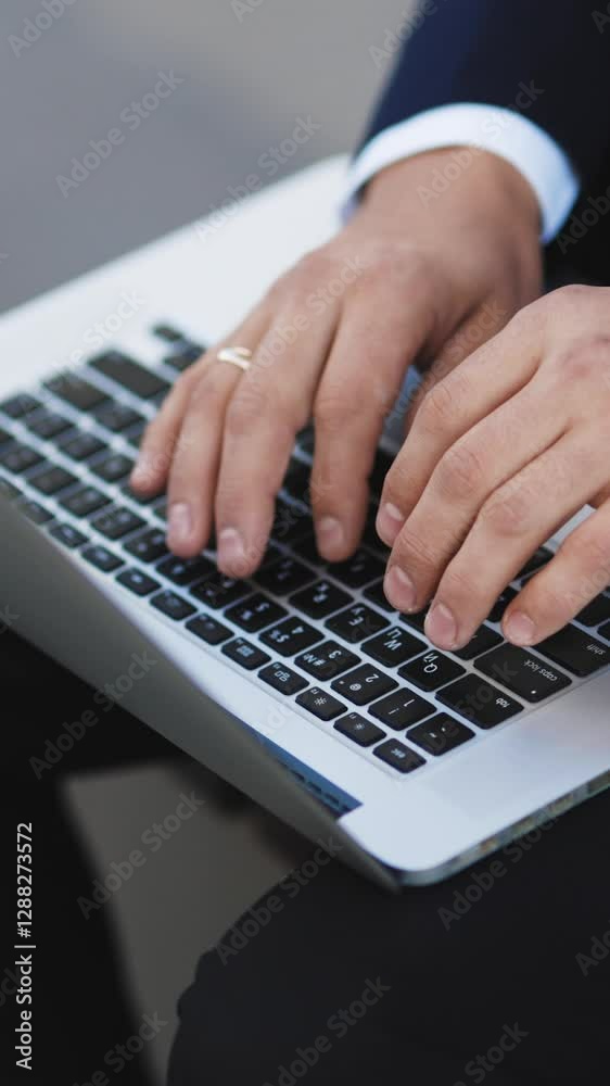 Vertical Video of Freelancer's hands typing on laptop keyboard. Businessman working with internet. Man searches new job on internet. Business concept. Unemployment. Lack of jobs. Financial crisis