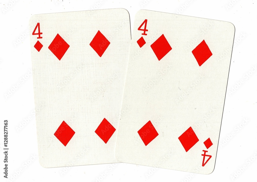 Obraz premium A hand of playing cards showing an identical pair on a white background.