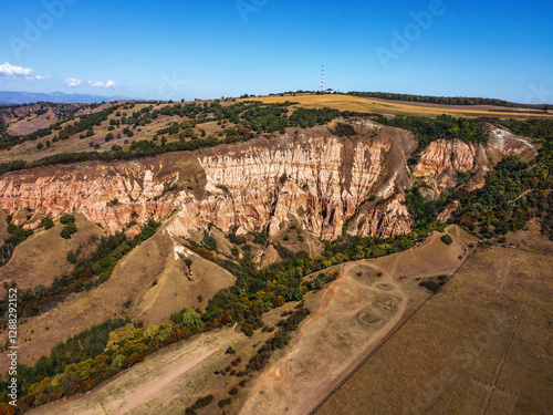 Râpa Roșie, Romania – Aerial View of the Unique Red Ravine Landscape
