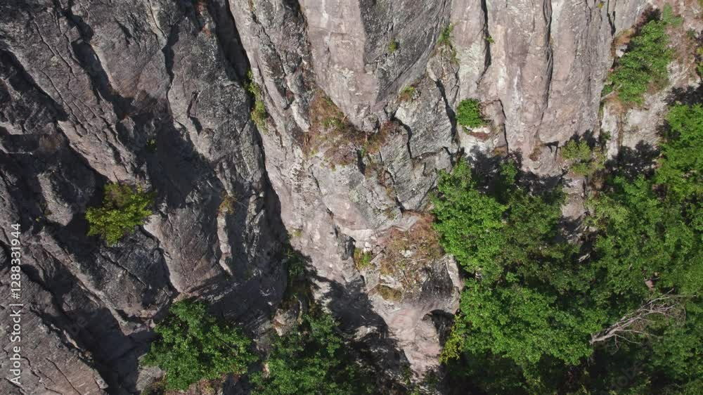 Aerial of natural mountain sport climbing andesite wall. Hradok, Vtacnik mountain range is fantastic high difficulty climbing location in Slovakia. Aerial of natural mountain sport climbing andesite wall. Hradok, Vtacnik mountain range is fantastic high difficulty climbing location in Slovakia.