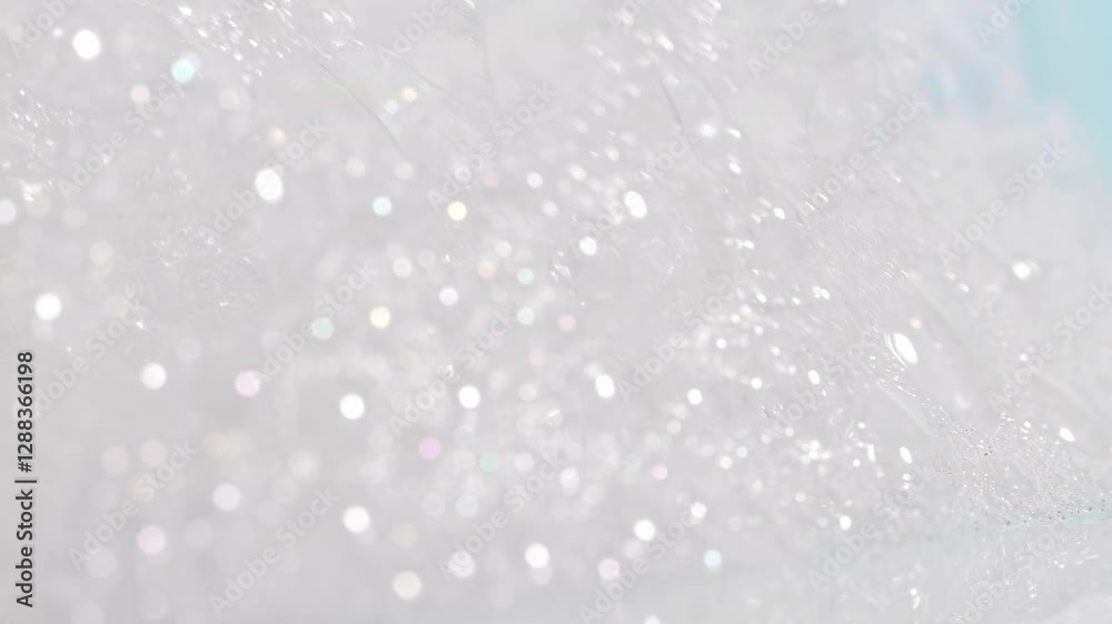 Soap foam, shampoo and hygiene product, white texture close-up. Soap foam, shampoo and hygiene product, white texture close-up.