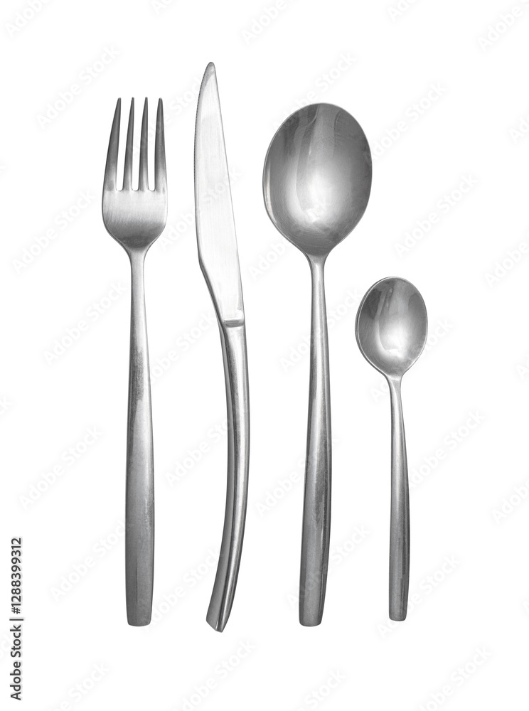 Silverware set lying on white background representing dining and eating habits Silverware set lying on white background representing dining and eating habits