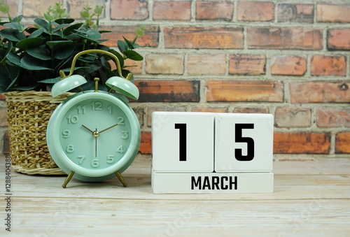 Wooden Calendar Showing the Date of March 15th. Day 15 of March month photo