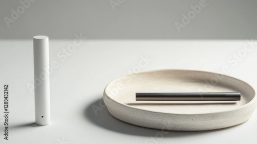 Wallpaper Mural Vaping device on a light grey surface with a simple decorative tray. Featuring tranquility and modern elegance Torontodigital.ca