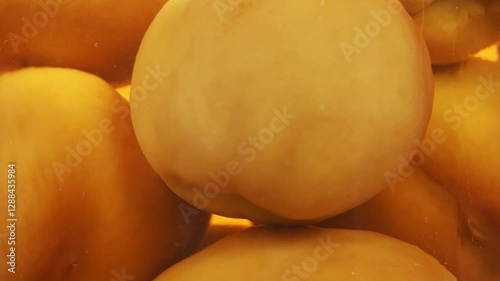 A Vibrant Collection of Fresh Yellow Fruits Raised and Piled Together in a Beautiful Arrangement