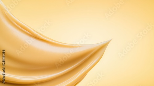 Soft, flowing fabric in warm golden tones creates serene and ele