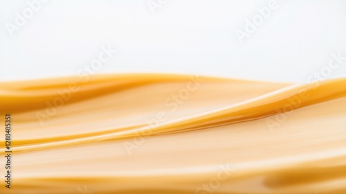 Soft, flowing fabric in warm yellow hues creates tranquil, seren