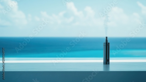 Vaping device on a white table with a calming ocean view in the background. Featuring serenity and escapism