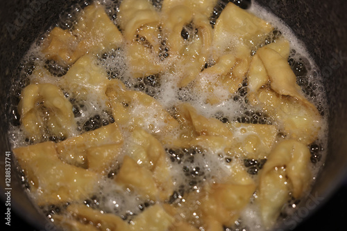 Angel wings (Faworki), cakes. Sweet pastry deep fried photo
