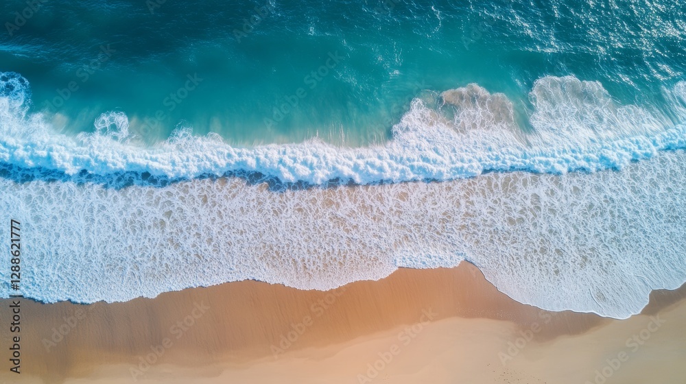Turquoise Waves Crashing on Golden Sand: Aerial Beach View