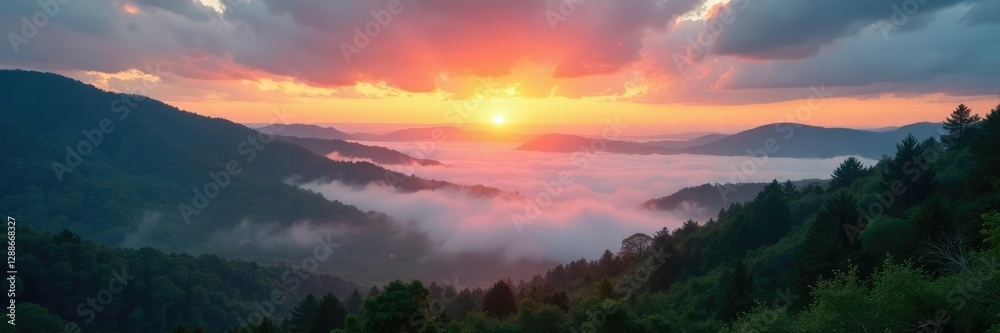 Fototapeta premium Gentle mist rises from valleys as sunrise breaks through, cloudy sky,