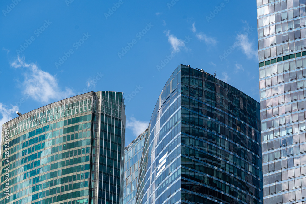 Obraz premium City skyscraper district. Business district. Modern city. Glass skyscrapers. Corporate real estate. Russia. Skyscrapers in the center of Moscow. High-rise buildings in the capital of Russia.