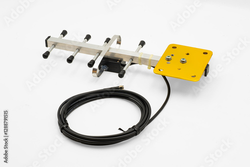 UHF radio antenna mounted on a sturdy base with coaxial cable for efficient signal transmission