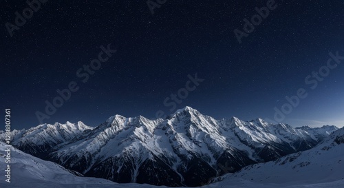 Majestic nighttime snowy mountain range under starry sky