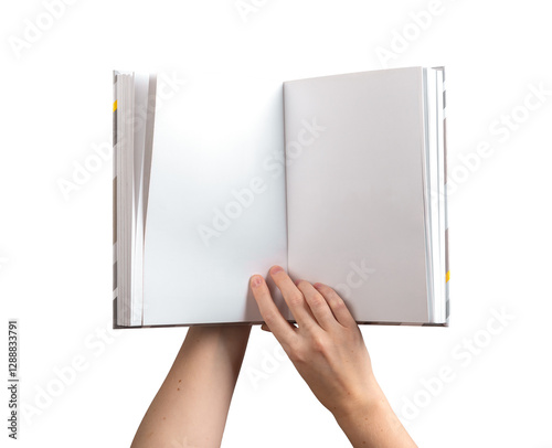 holding an open, blank book or notebook with both hands, showcasing the clean pages for reading or design purposes. for presentations, business use, or educational content. Isolated on a white