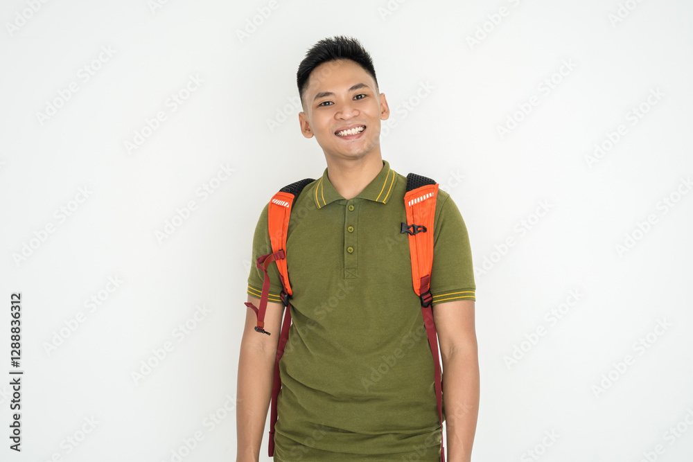 Happy young man dressed casually with a bright orange backpack, smiling against a clean white background. Happy young man dressed casually with a bright orange backpack, smiling against a clean white background.