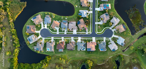 Photos Upscale suburban homes with large backyards and green grassy lawns