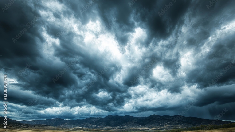 Dramatic Dark Storm Clouds Over Majestic Mountains Beneath the Brooding Sky in a Serene Nature Landscape Dramatic Dark Storm Clouds Over Majestic Mountains Beneath the Brooding Sky in a Serene Nature Landscape