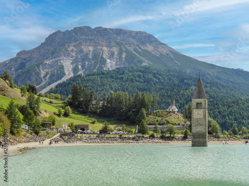 Bell tower in Lake Reschen photo