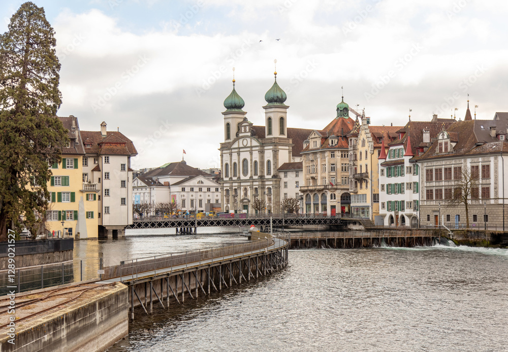 Switzerland, Lucerne. Old city, Altstadt. Jesuit Church and other historic buildings on the banks of Reuss River. Switzerland, Lucerne. Old city, Altstadt. Jesuit Church and other historic buildings on the banks of Reuss River.