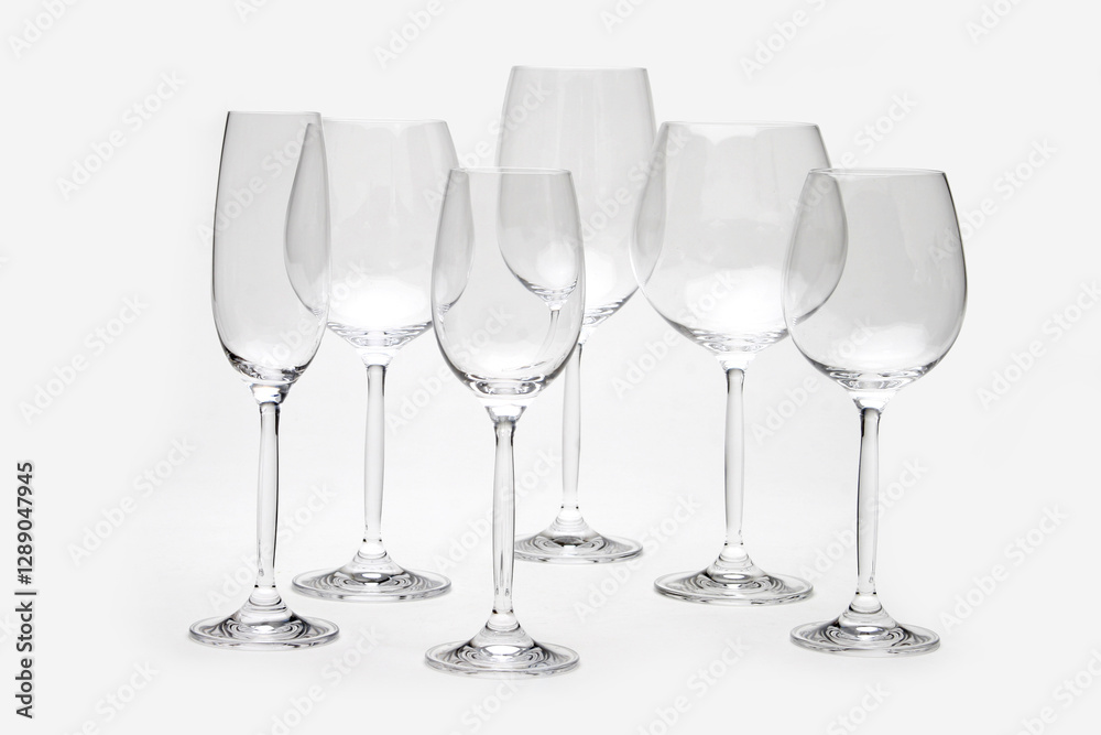 Wine glasses arranged symmetrically, awaiting sommelier sampling or festive toasting Wine glasses arranged symmetrically, awaiting sommelier sampling or festive toasting