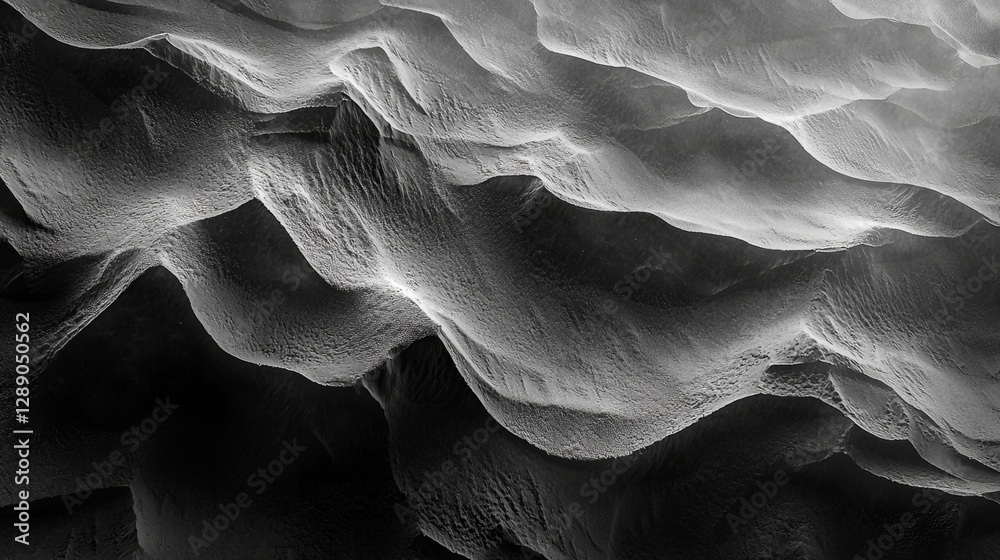 Abstract Black and White Texture of Waves in Shadows and Light Displaying Natural Forms and Patterns in Fine Detail Abstract Black and White Texture of Waves in Shadows and Light Displaying Natural Forms and Patterns in Fine Detail