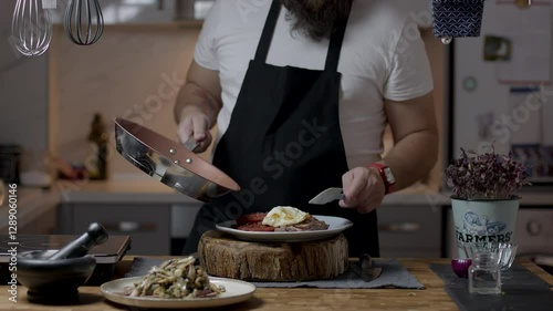 Chef close-up preparing beef with root vegetables. cooking process