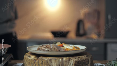 Final touch in serving the dish. Cooking process. Dish with meat and vegetables