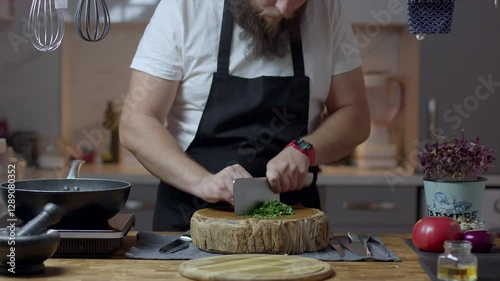 Chef close-up preparing beef with root vegetables. cooking process