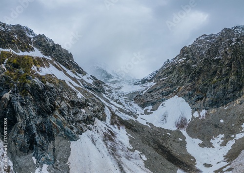  moraine and Chalaadi Glacier in Caucasus mountains, direct movement, aerial view