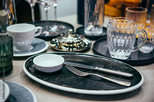 Obraz na płótnie Different plates and dinnerware on sale for a restaurant of hotel business. w salonie