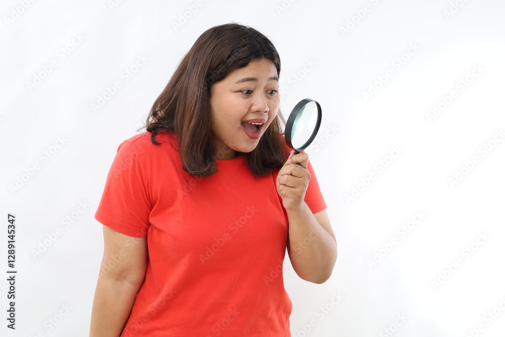 Excited woman in formal clothes look through magnifying glass with amazed face, found interesting promo, standing on white background. Excited woman in formal clothes look through magnifying glass with amazed face, found interesting promo, standing on white background.