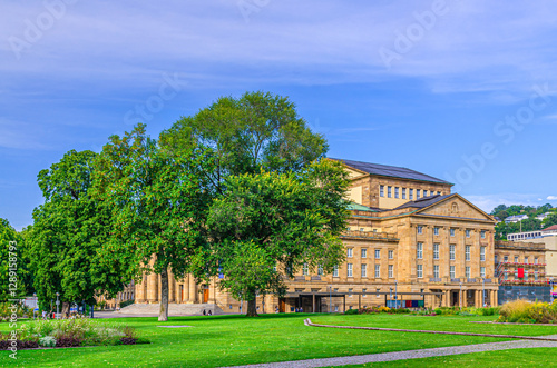 Wallpaper Mural Staatstheater Stuttgart State Theatre, Staatsoper Stuttgart State Opera House and garden with green trees and grass lawn in old town Stuttgart city historic center, Baden-Württemberg state, Germany Torontodigital.ca