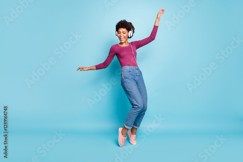 Fotografie Full body photo of cheerful funny mulatto girl have free time listen music on he