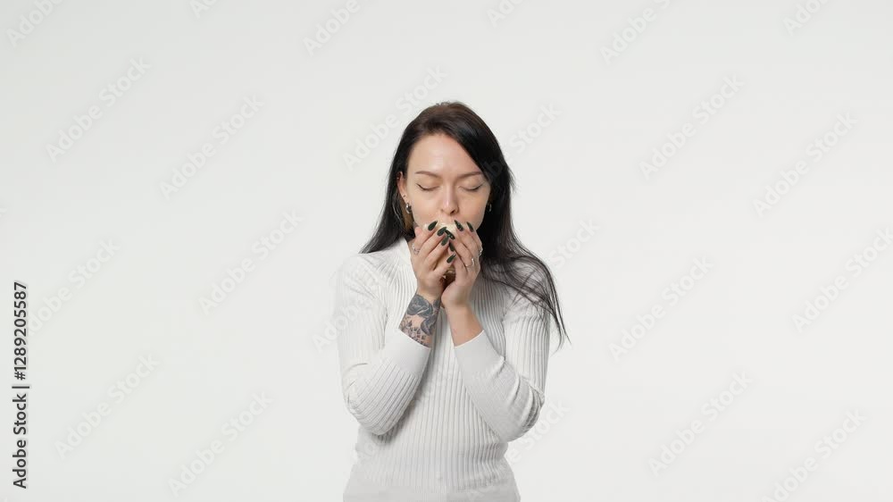 Woman enjoying morning with a cup of coffee on white background copy space Woman enjoying morning with a cup of coffee on white background copy space