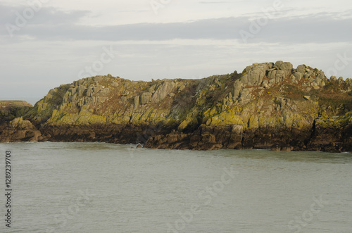 Rocky headland in the Pointe du Grouin. Brittany. France.