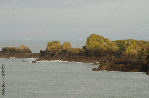 Rocky headland in the Pointe du Grouin. Brittany. France.
