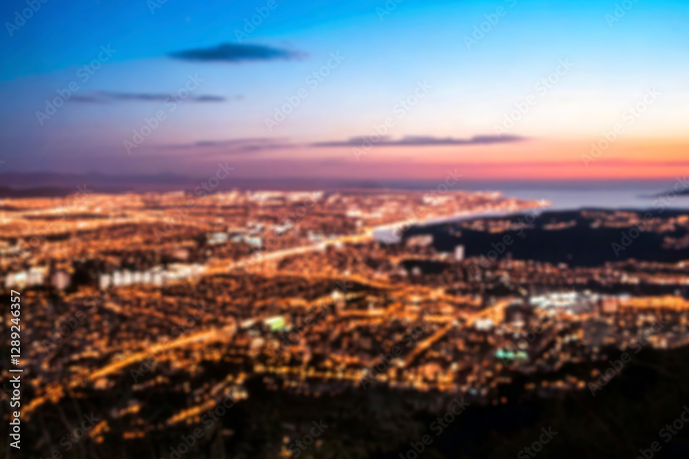 Obraz premium The lights of the night city. Blurred background. Lanterns on the street. big city lights in the twilight evening with blurring. Colorful circles of light abstract. circular bokeh on blue horizon.