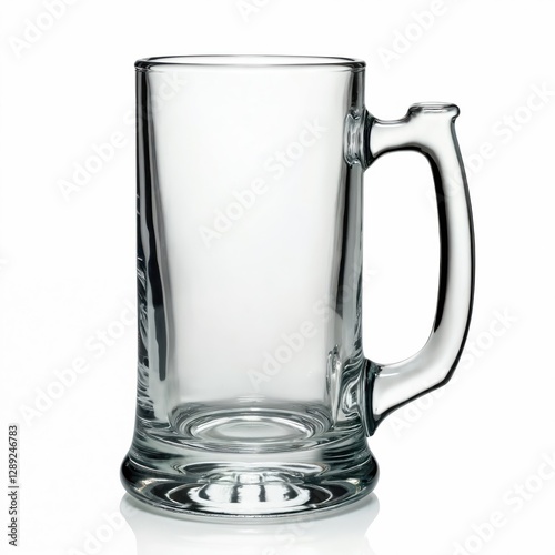An empty clear beer glass stein isolated on white background. Pint mug with handle ready for beverage. Transparent blank glassware for product mockup, cool drink. Fresh clean reusable cup.
