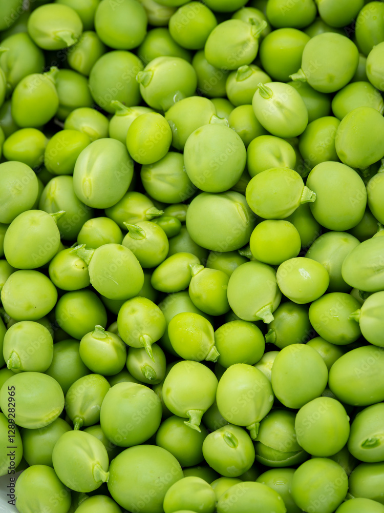 macro close-up of fresh organic green peas - food and agriculture concept macro close-up of fresh organic green peas - food and agriculture concept
