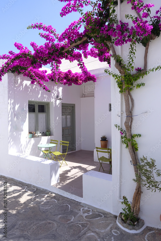 Fototapeta premium Picturesque main village of Kimolos island with beautiful cycladeic architecture built above of port Psathi, Cyclades, Greece