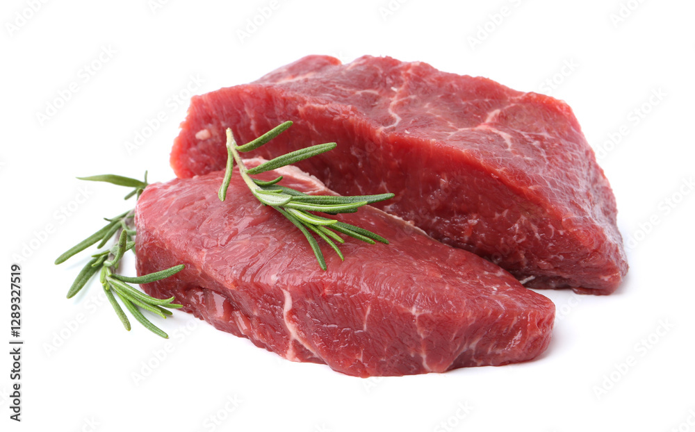 Pieces of raw beef meat with rosemary isolated on white Pieces of raw beef meat with rosemary isolated on white