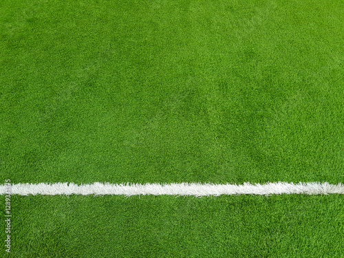 Green artificial grass field texture background concept with white lines, used for sports scenes, outdoor and indoor football, futsal, playground, golf.