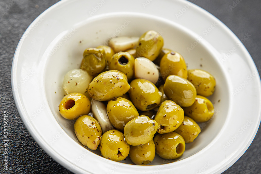 olives mediterranean snack garlic aperitif fresh tasty food dish gourmet food background on the table rustic food top view copy space vegetarian and vegan food olives mediterranean snack garlic aperitif fresh tasty food dish gourmet food background on the table rustic food top view copy space vegetarian and vegan food
