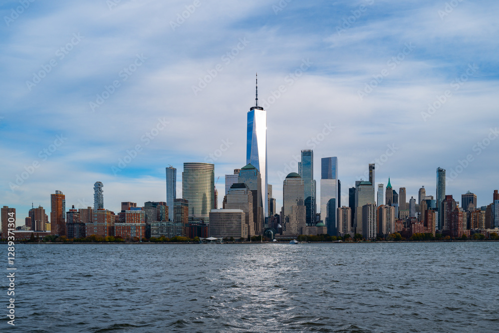 Obraz premium New York City skyline. NYC skyscrapers reflections in water. Manhattan skyline over Hudson River. NY cityscape. Downtown New York buildings. NYC skyline. NYC skyline. Hudson and Manhattan.