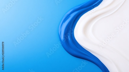 White and royal blue abstract flowing wave, glossy texture with soft folds, high contrast minimal background, smooth liquid motion for creative product mockups

